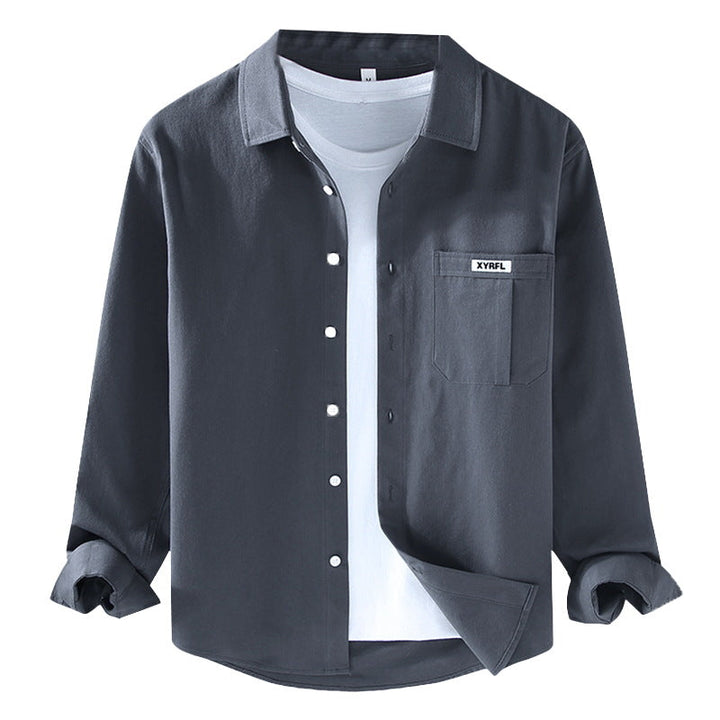 Elegante camicia retrò da uomo a maniche lunghe in morbido cotone con funzionale tasca sul petto