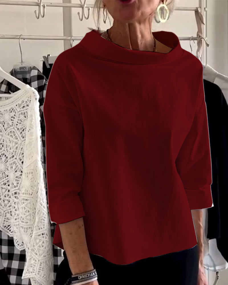 Elegante blusa da donna con maniche a 3/4 e ampio scollo a barca, perfetta per ogni occasione