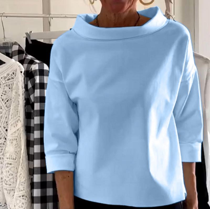 Top da donna elegante con collo alto di tendenza per uno stile unico