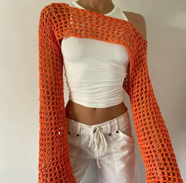 Top da donna alla moda in rete trasparente: una scelta elegante e di classe