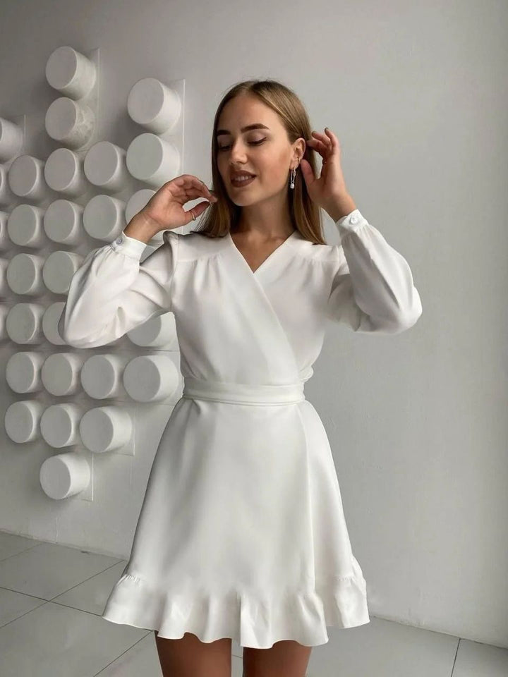 <p>Divertente mini abito a campana per un look giocoso</p>