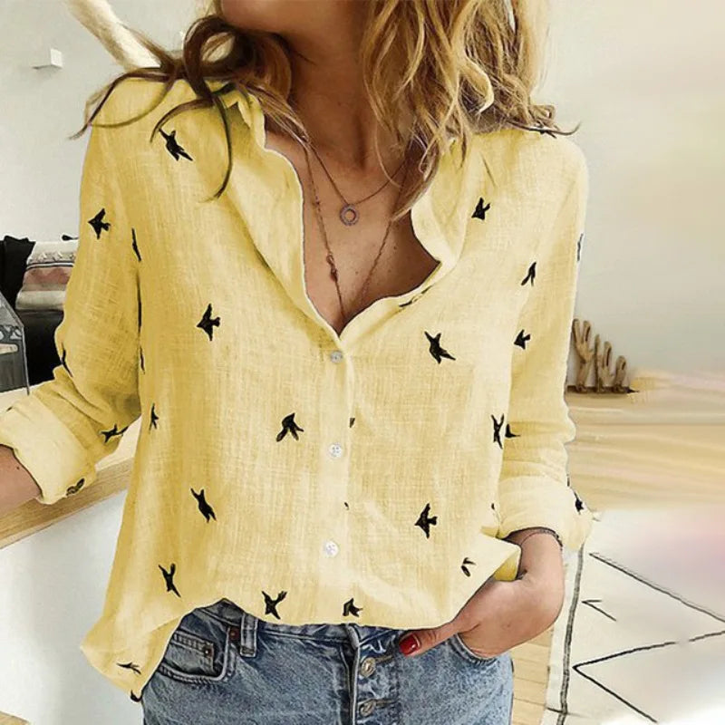 Elegante camicia da donna a maniche lunghe con design a uccello ed elegante chiusura a bottoni