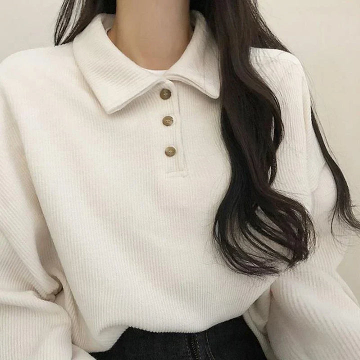 Elegante camicetta da donna a maniche lunghe con colletto unico, che aggiunge eleganza e classe