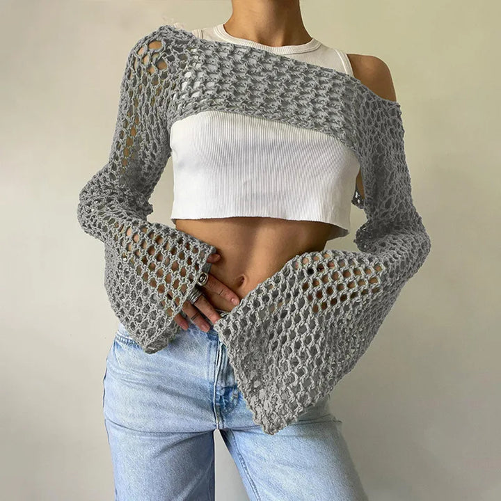 Top da donna alla moda in rete trasparente: una scelta elegante e di classe