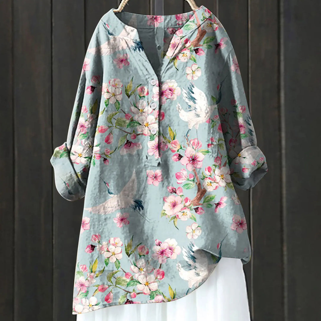 Elegante camicia floreale da donna con mezzo bottone e maniche lunghe - eleganza e fascino femminile