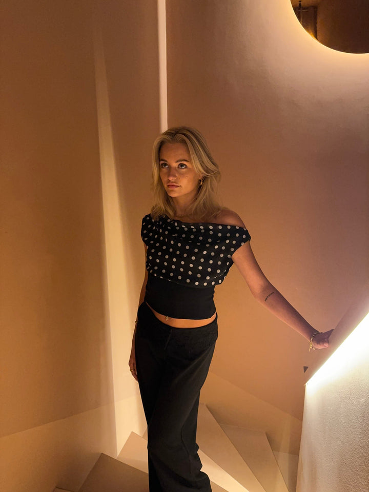 <div>Affascinante Top a Pois Lina</div>