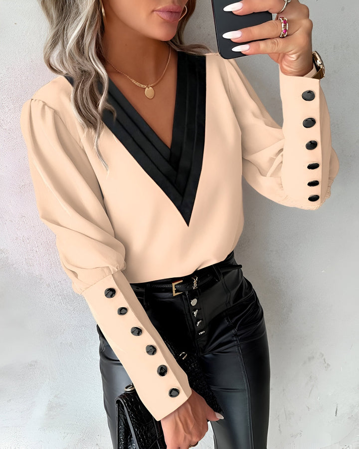 Caris - Blusa V-scollo trendy con accenti color block eleganti