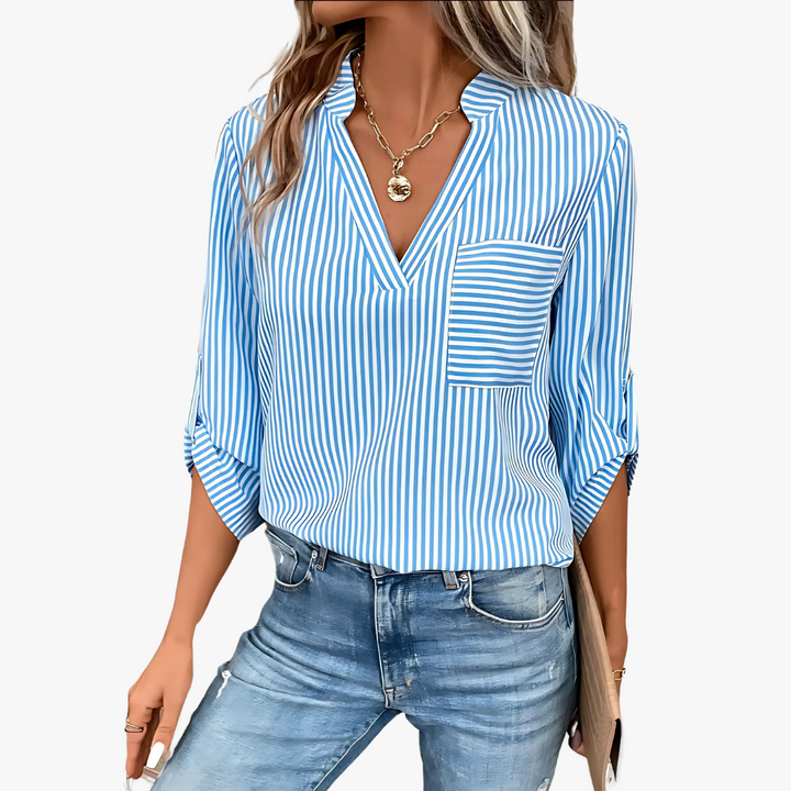 Camicetta da donna elegante con righe di tendenza - stile e versatilità senza tempo