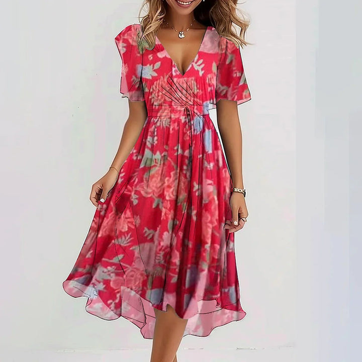 <div>Odilia - Elegante abito midi avvolgente con stampa alla moda</div>