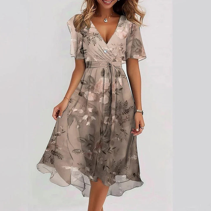 <div>Odilia - Elegante abito midi avvolgente con stampa alla moda</div>