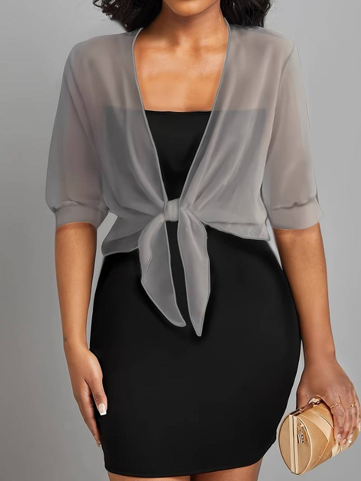 <div>Katie – Blusa Elegante con Apertura Fresca sul Davanti</div>