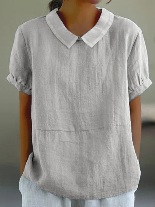 Elegante blusa da donna in lino con maniche a buccia d'arancia e colletto classico