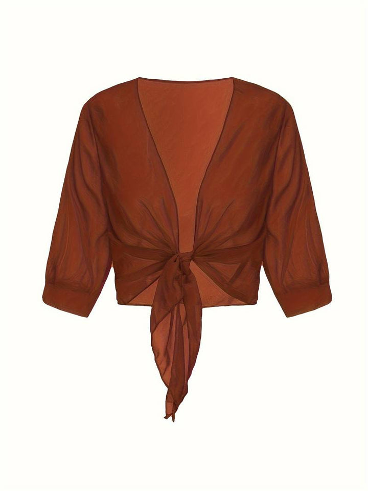 <div>Katie – Blusa Elegante con Apertura Fresca sul Davanti</div>