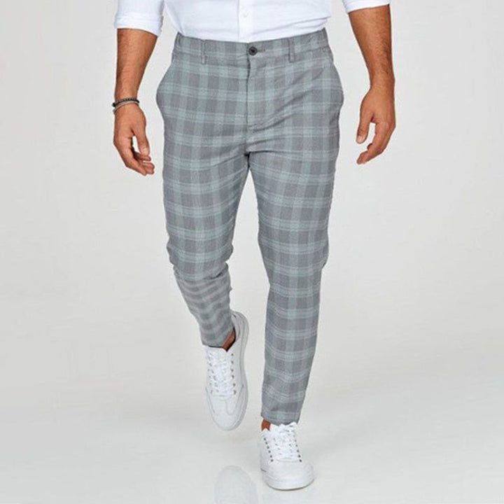 Eleganti pantaloni slim fit da uomo con motivo a quadri di tendenza: un look unico e alla moda