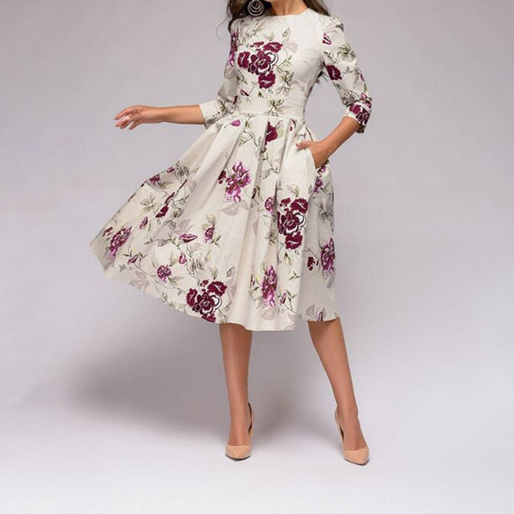 <div>Incantevole Abito Midi Elaina con Stampa Floreale e Pratiche Tasche per Donne</div>