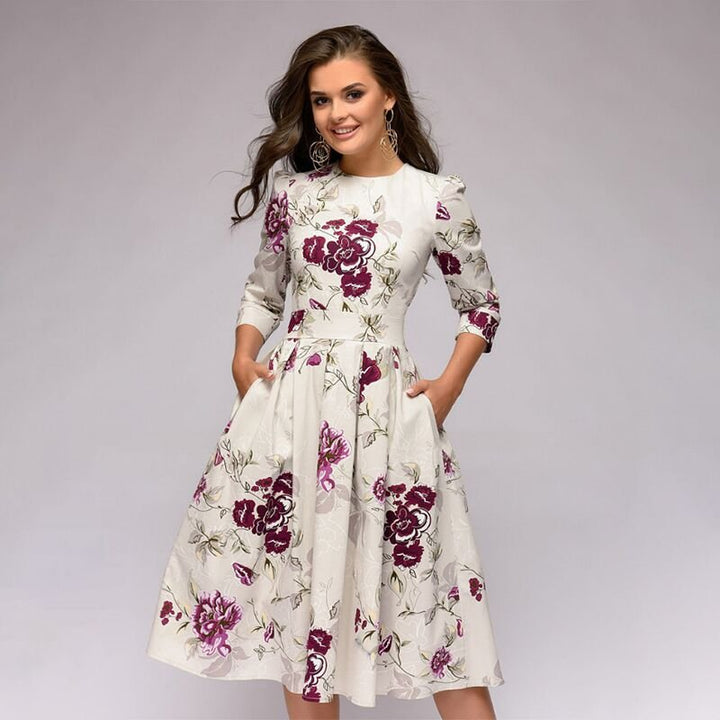 <div>Incantevole Abito Midi Elaina con Stampa Floreale e Pratiche Tasche per Donne</div>