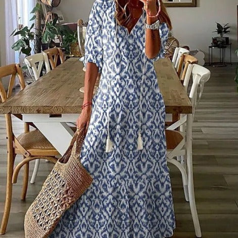 <html><body><p>Lilly - Elegante maxi dress con stampa floreale e maniche a metà con scollatura a V</p></body></html>