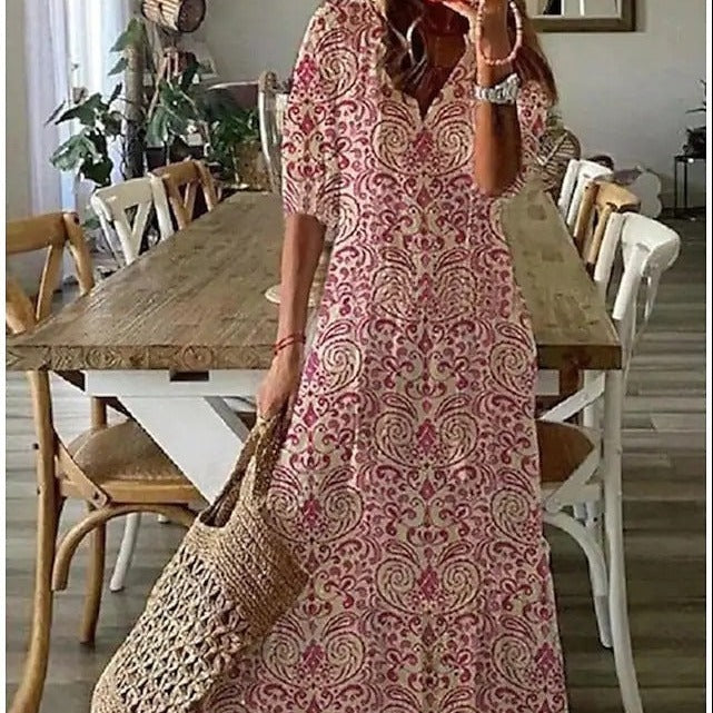 <html><body><p>Lilly - Elegante maxi dress con stampa floreale e maniche a metà con scollatura a V</p></body></html>