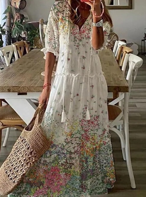 <html><body><p>Lilly - Elegante maxi dress con stampa floreale e maniche a metà con scollatura a V</p></body></html>