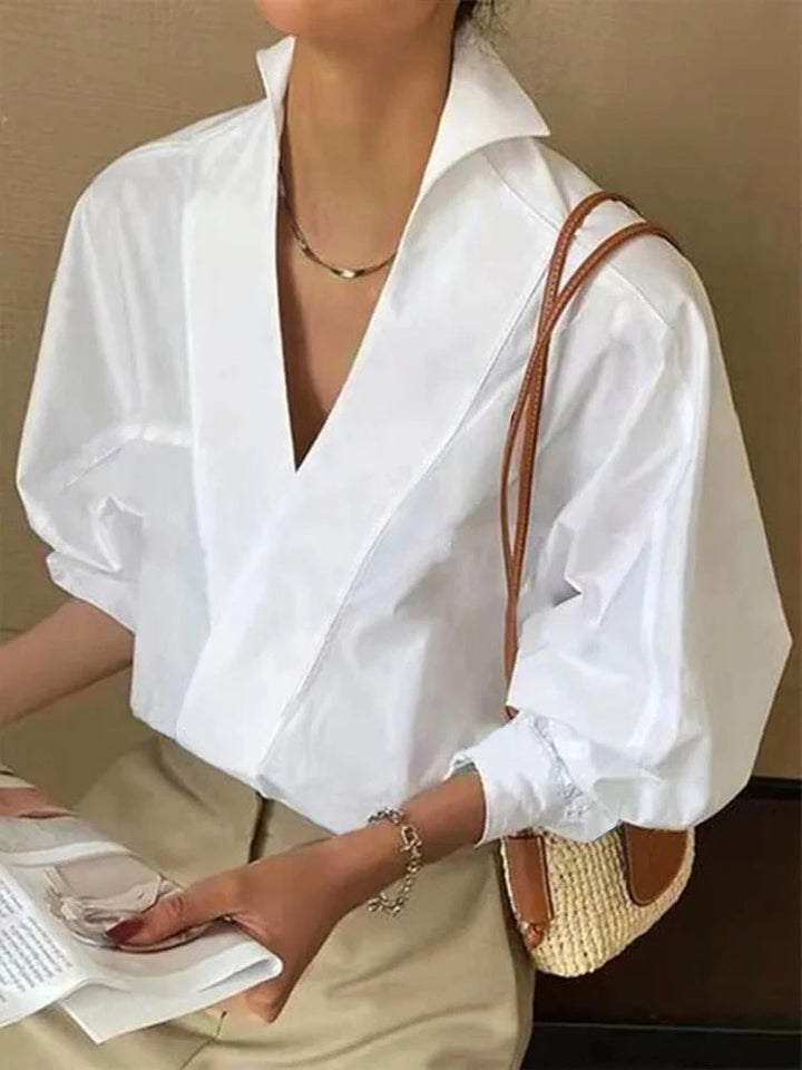 <p>Elinne - Blusa Casual alla Moda per Donne con Delicate Maniche a Sbuffo e Elegante Collo a V</p>